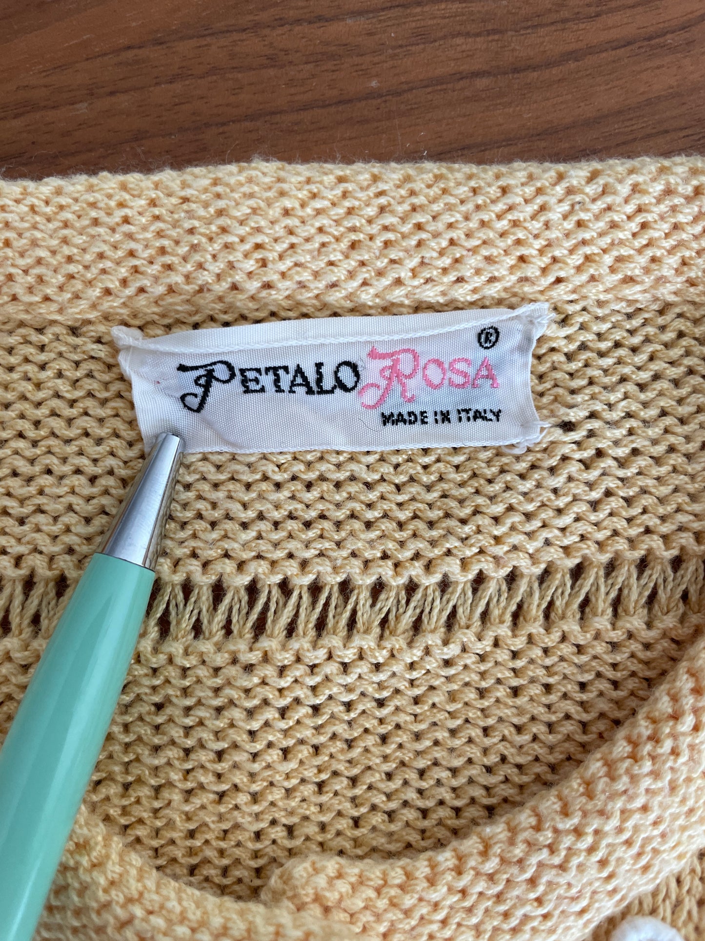 Yellow knitted vintage cardigan with daisies
