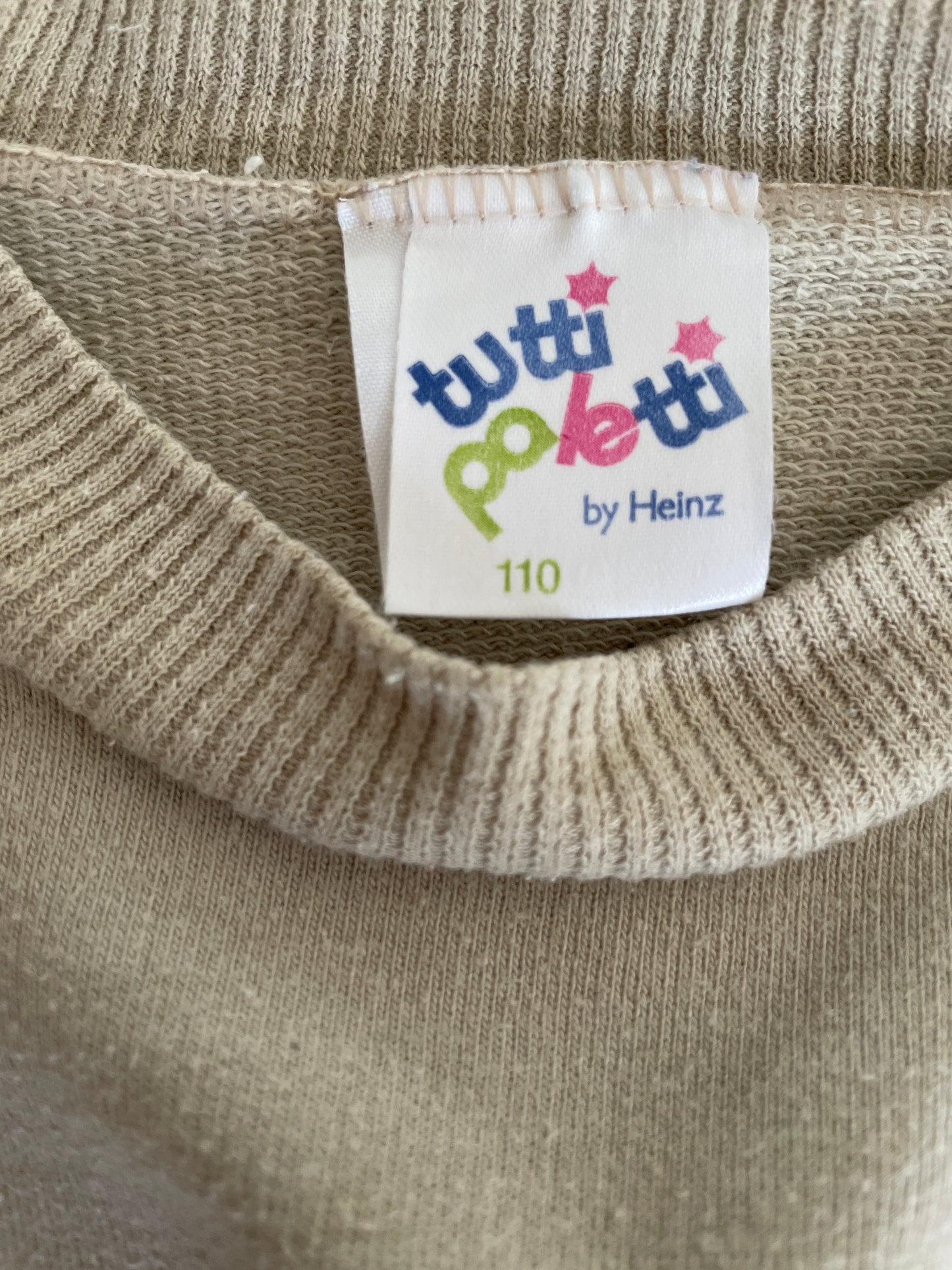 Neutral colors with bright print vintage sweatshirt