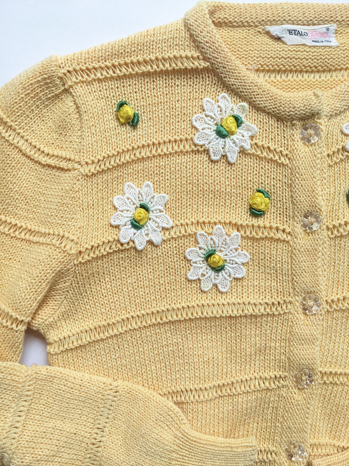 Yellow knitted vintage cardigan with daisies