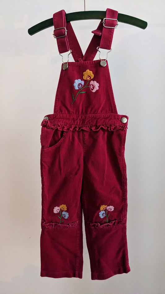 Red corduroy overall with frill and flowers