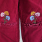 Red corduroy overall with frill and flowers