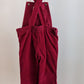 Red corduroy overall with frill and flowers